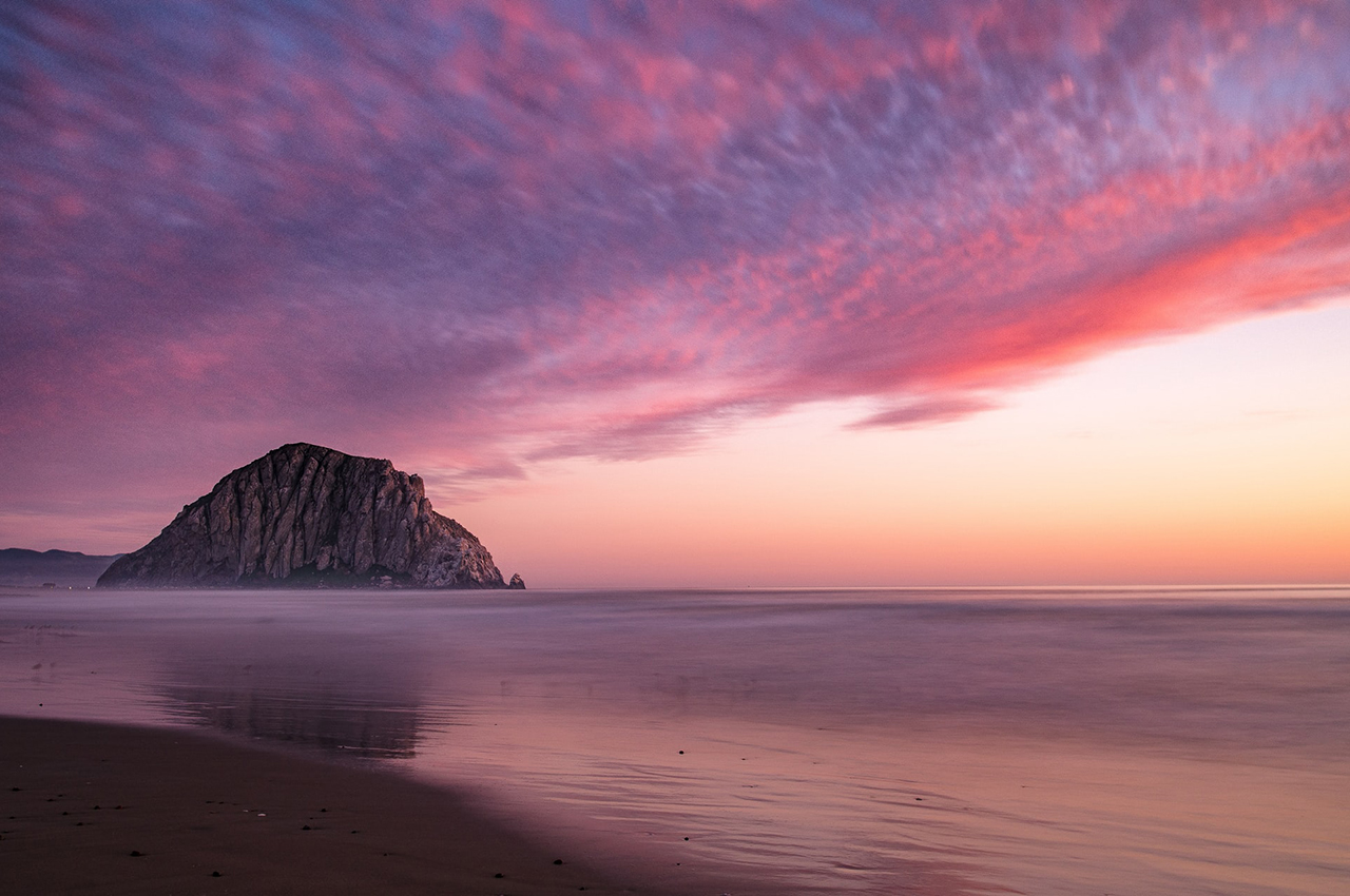 Morro Rock in Morro Bay during sunset.